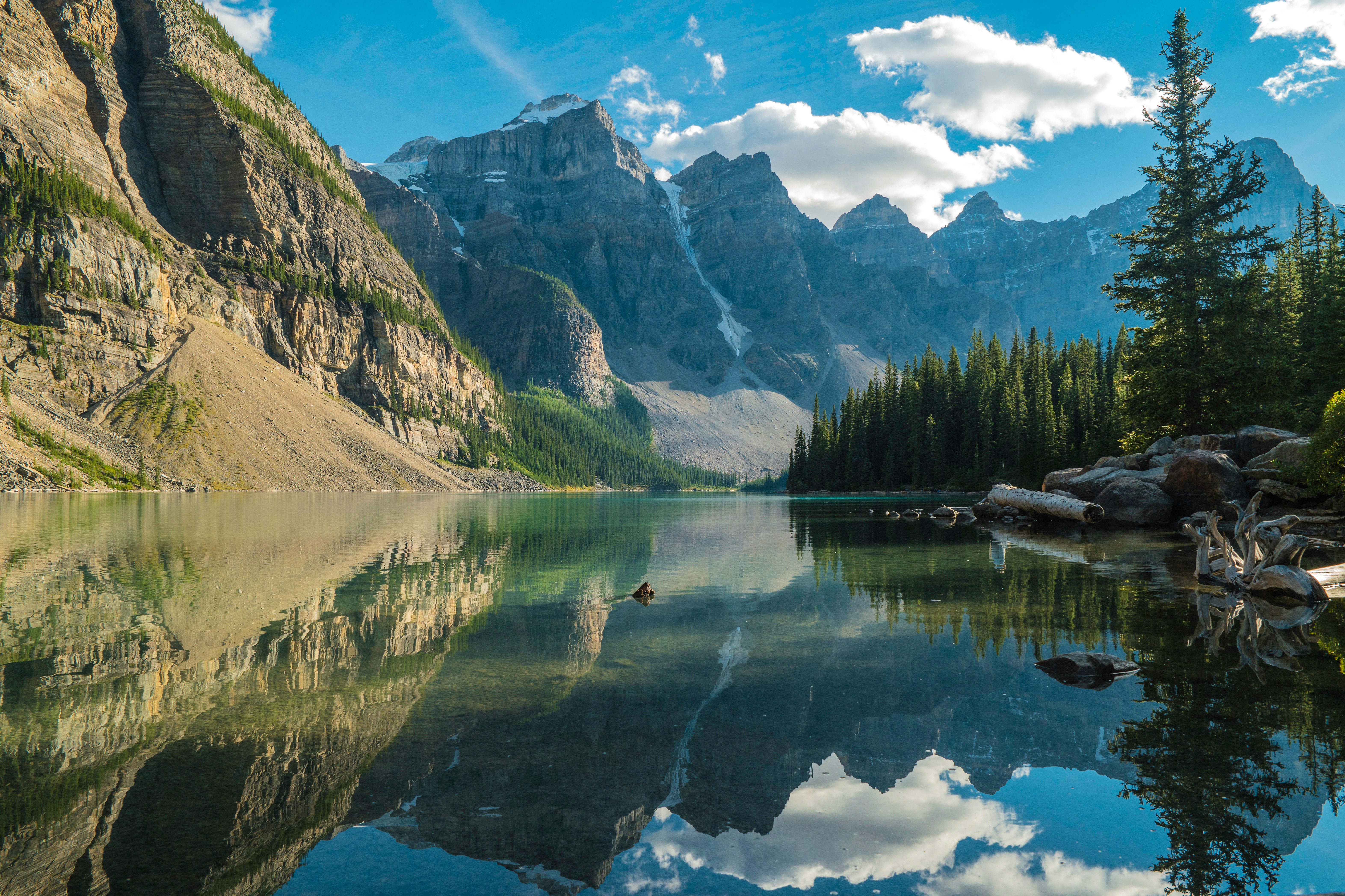 A lake surrounded by mountains representing the central important of the ecosystem